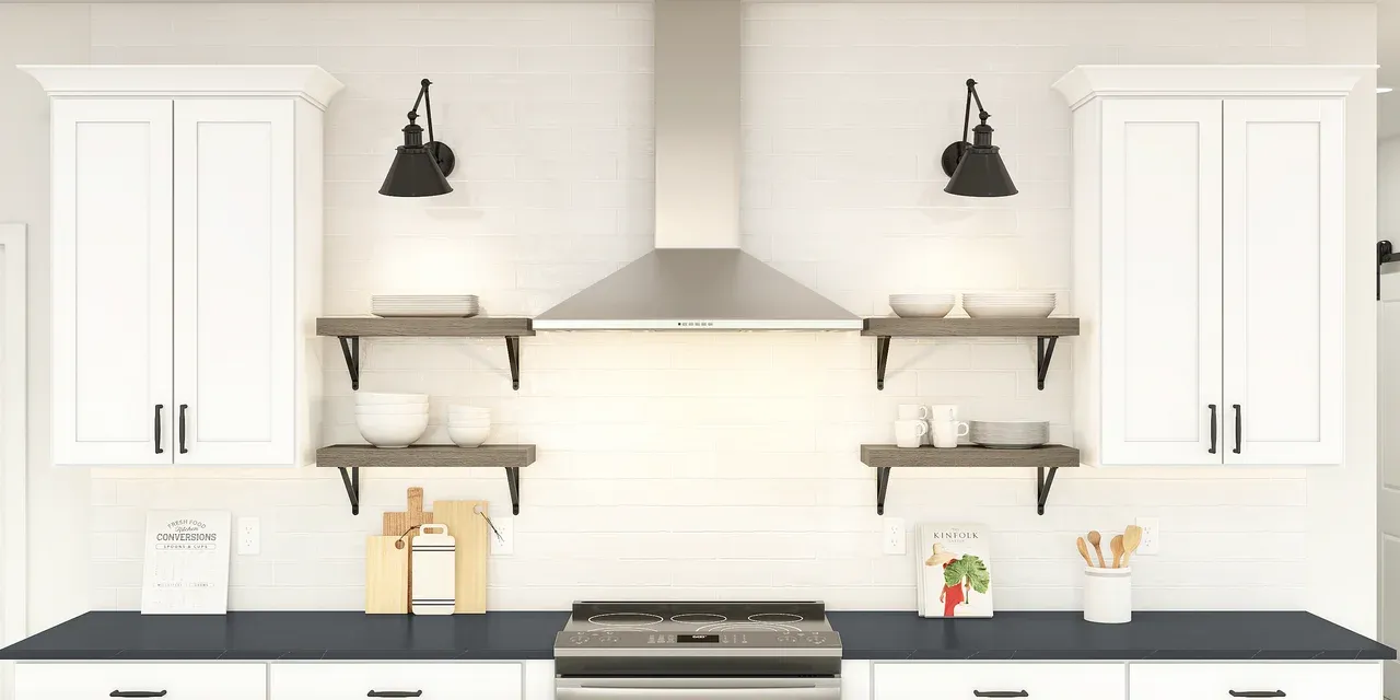 Kitchen with stainless steel hood and full backsplash