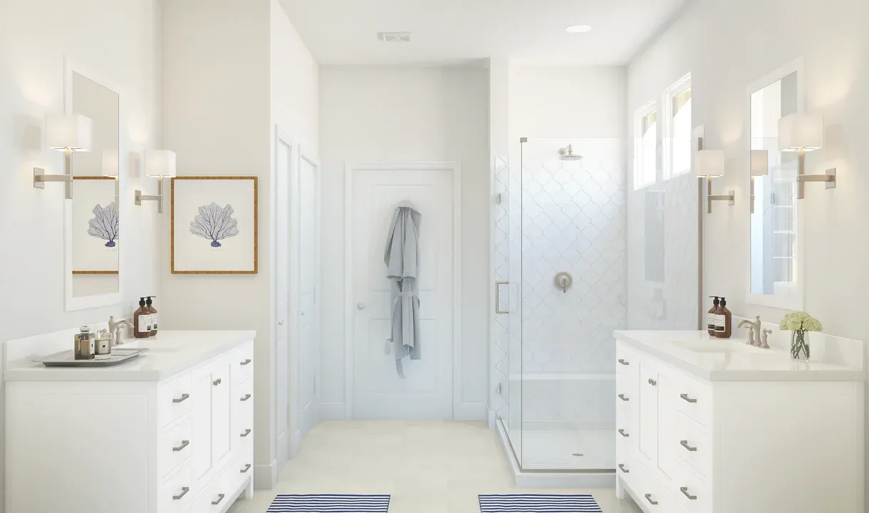 Primary bath with dual sinks and glass shower enclosure