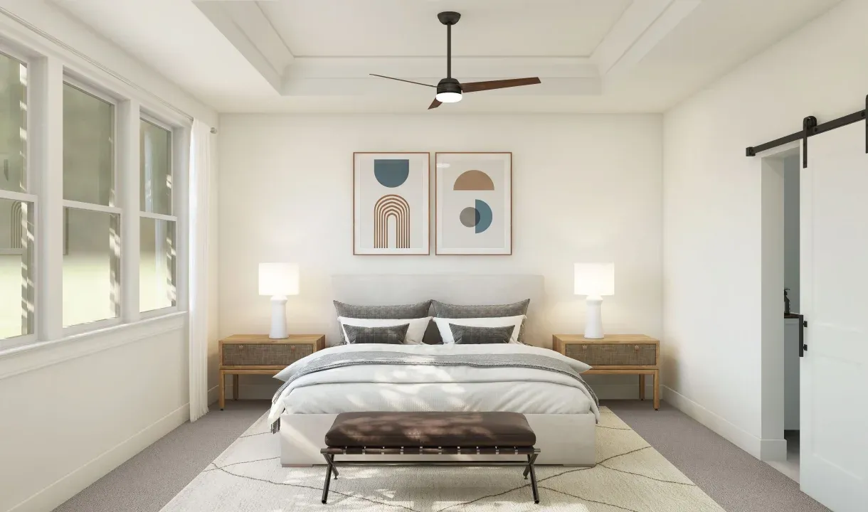 Primary suite with ceiling fan and crown moulding