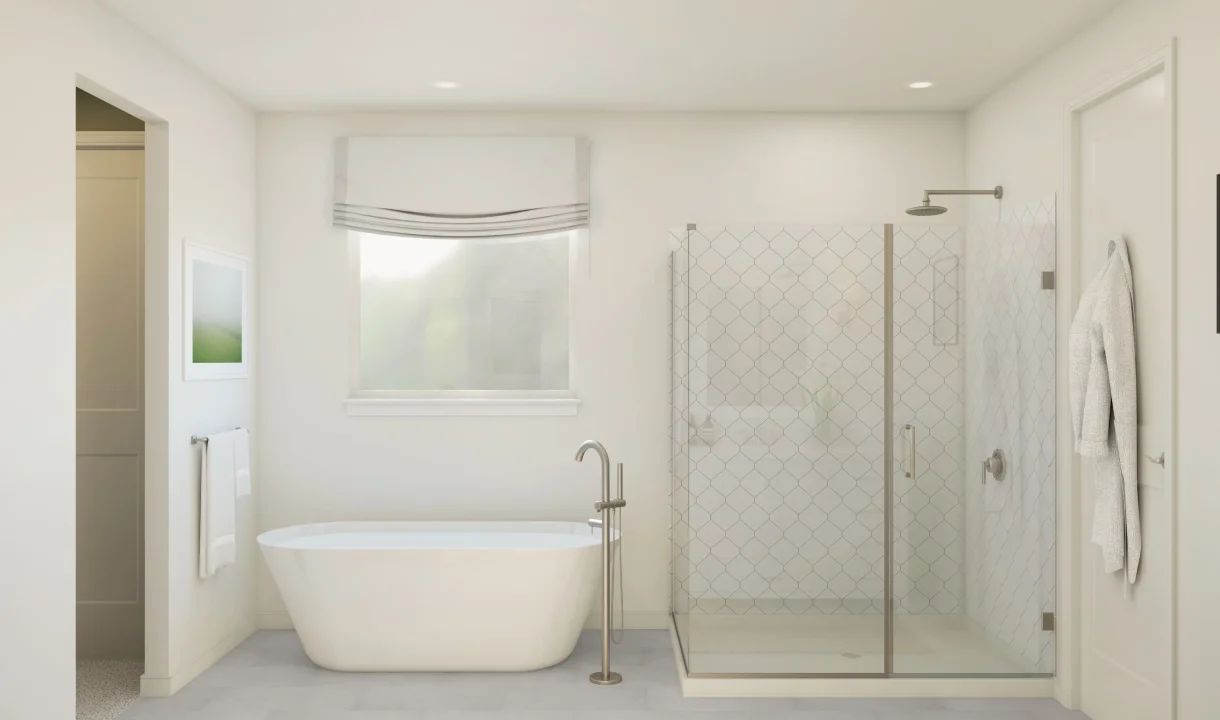 Primary bath with freestanding tub and glass shower enclosure