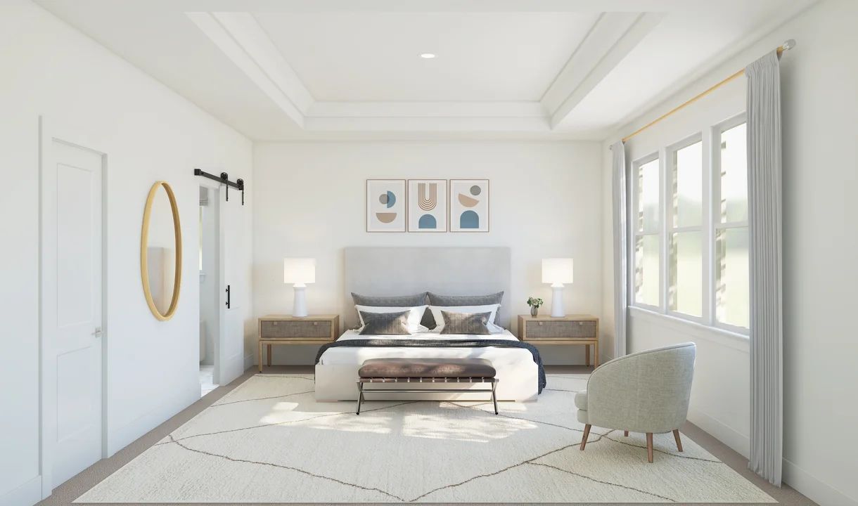 Primary suite with crown moulding and private primary bath