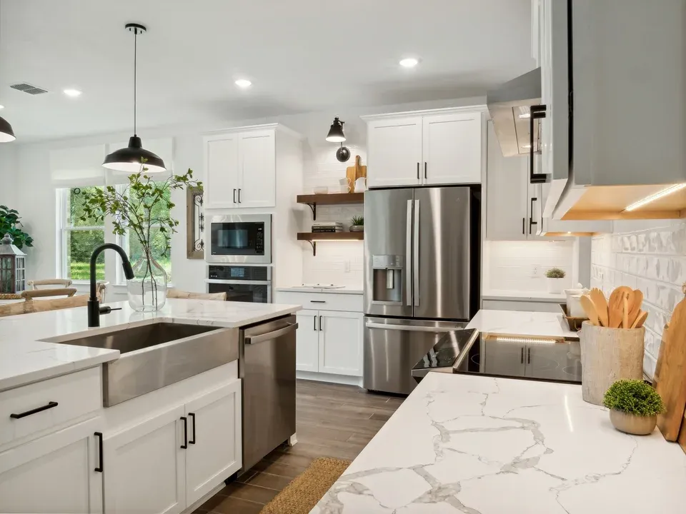 Kitchen with stainless steel apron-front sink