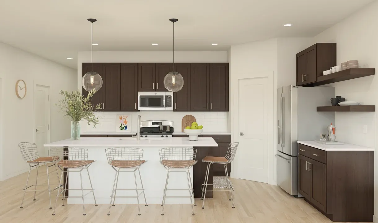Kitchen with vast island & pendant lights