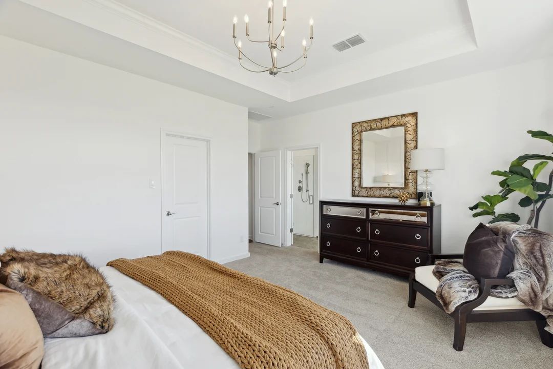 Primary suite with chandelier