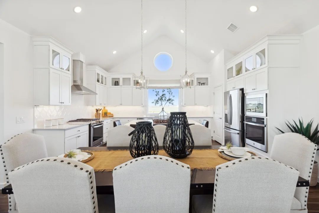 Dining area with vaulted ceiling