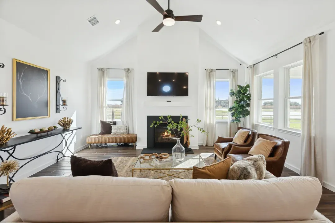 Great room with vaulted ceiling and fireplace