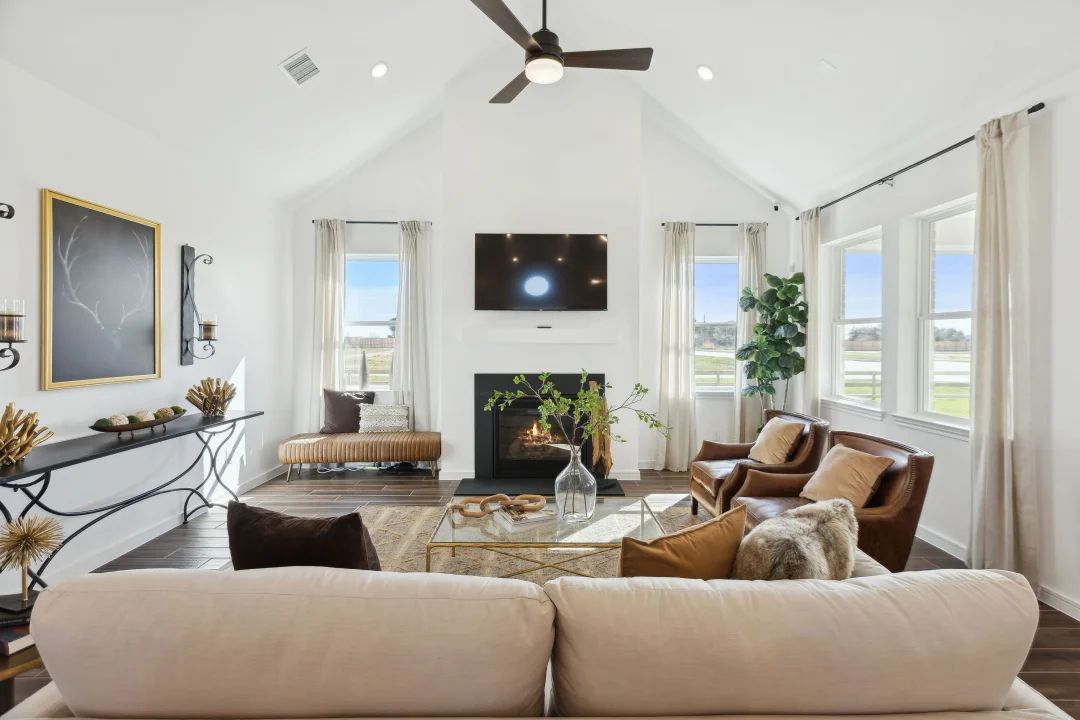 Great room with vaulted ceiling and fireplace