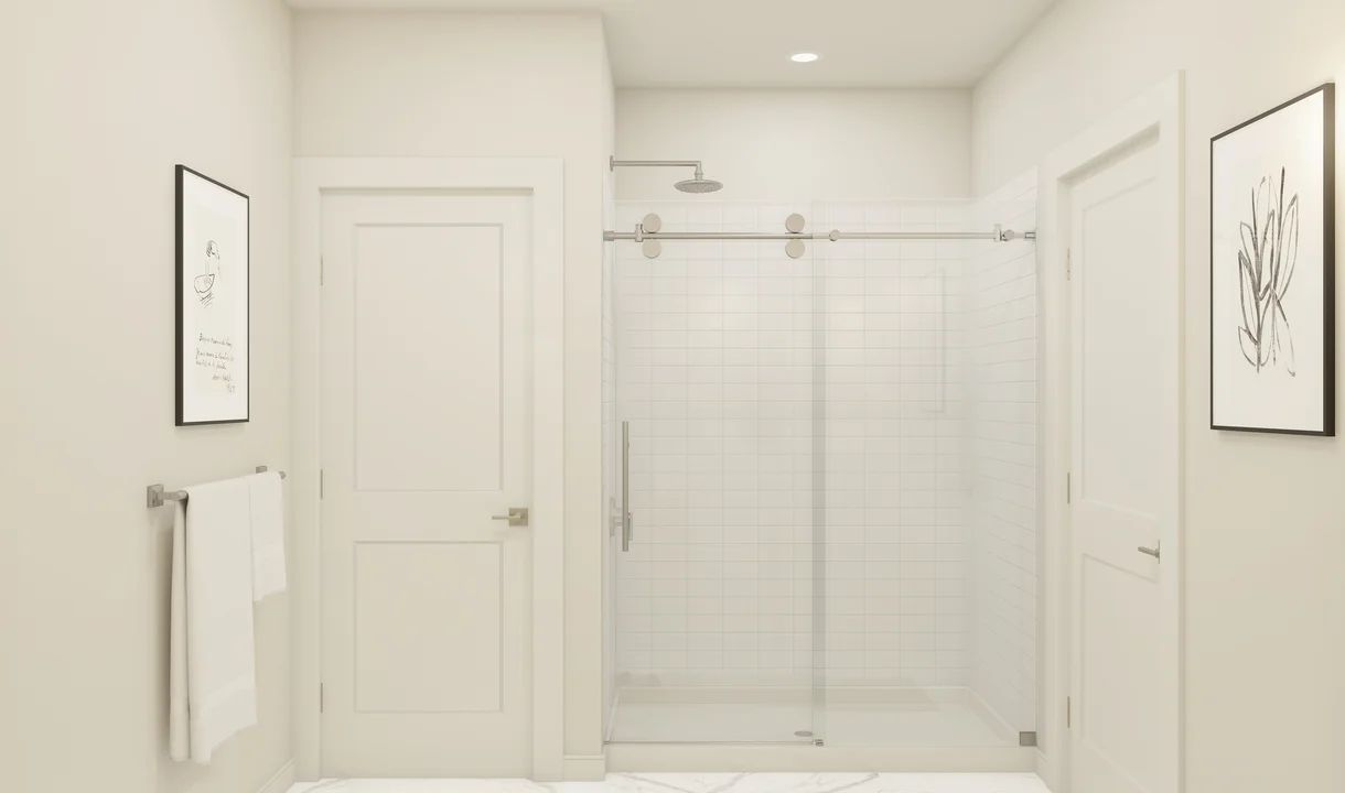 Primary bath with glass shower enclosure
