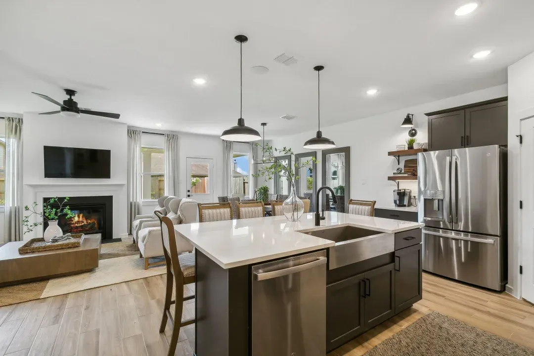 Kitchen with stainless steel apron-front sink