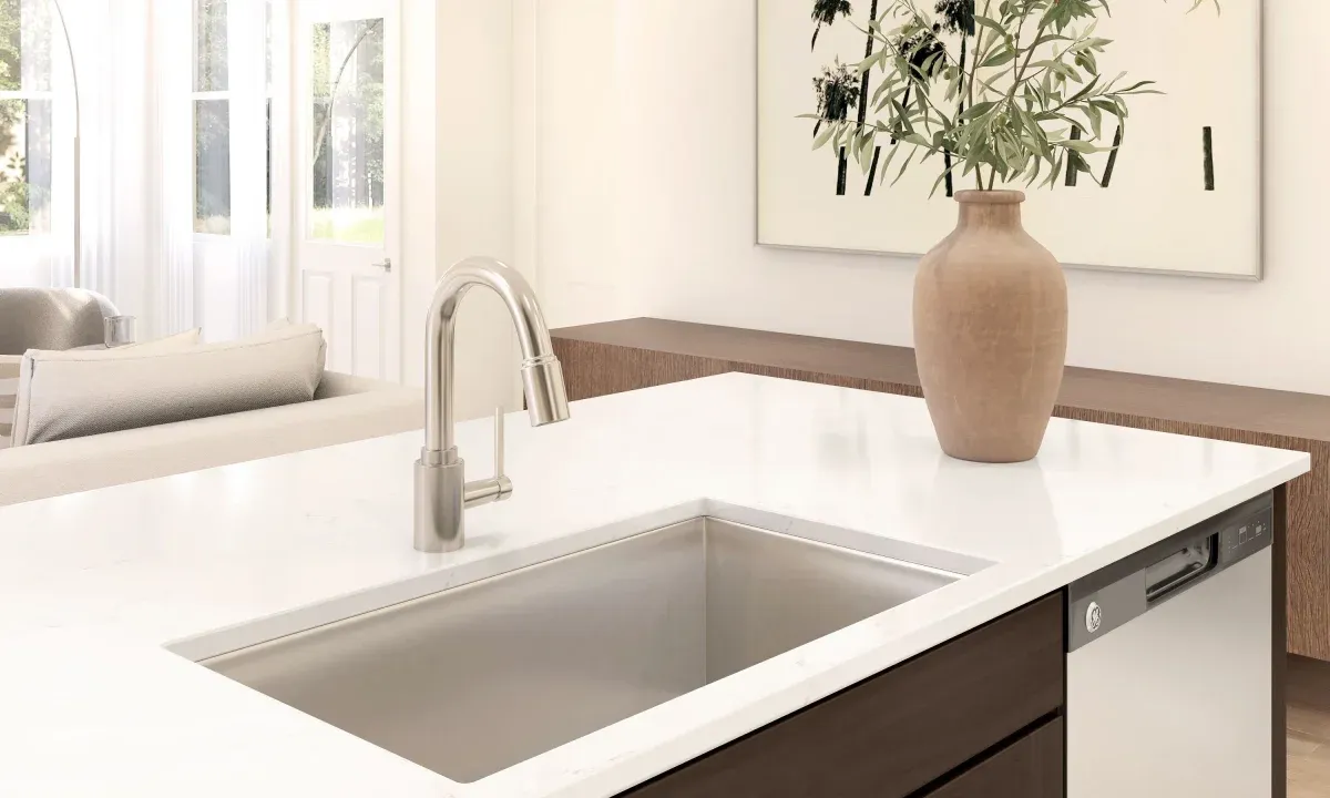 Kitchen with stainless steel faucet