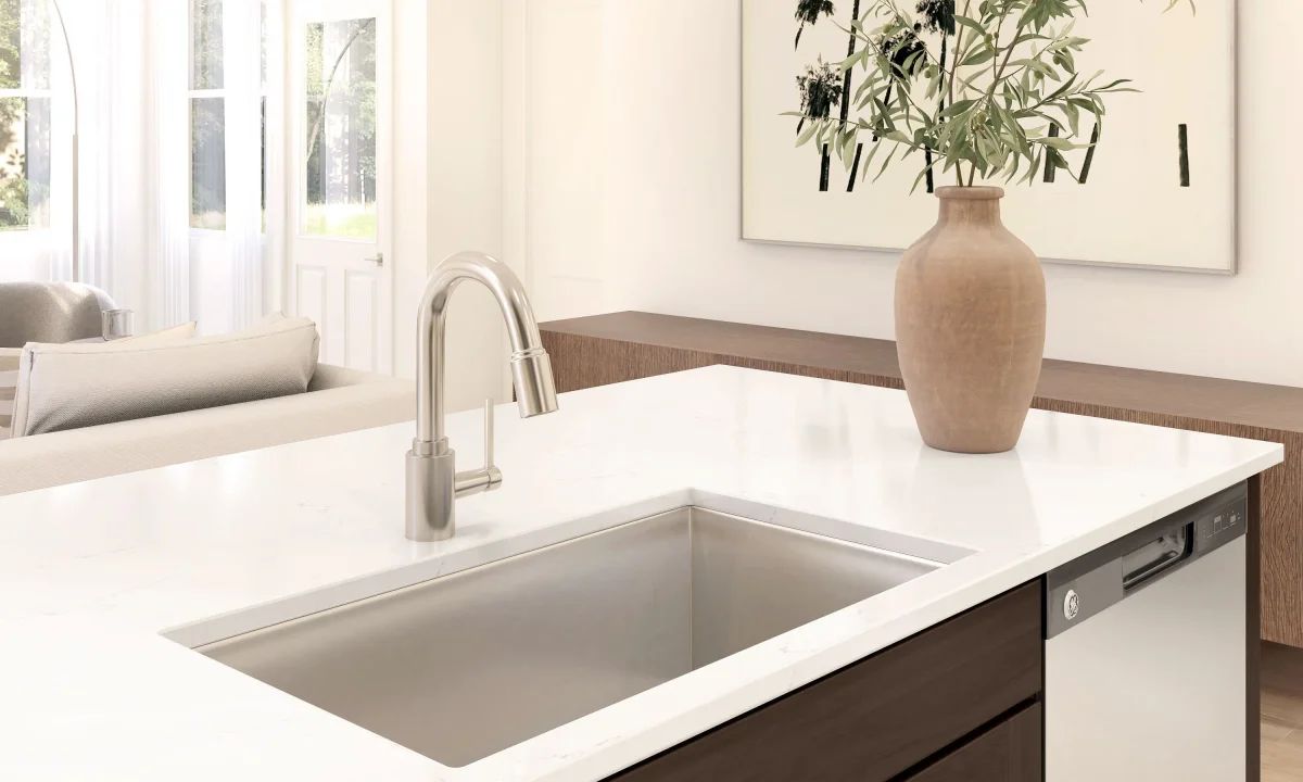 Kitchen with stainless steel faucet