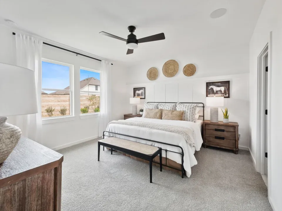 Primary suite with decorative feature wall