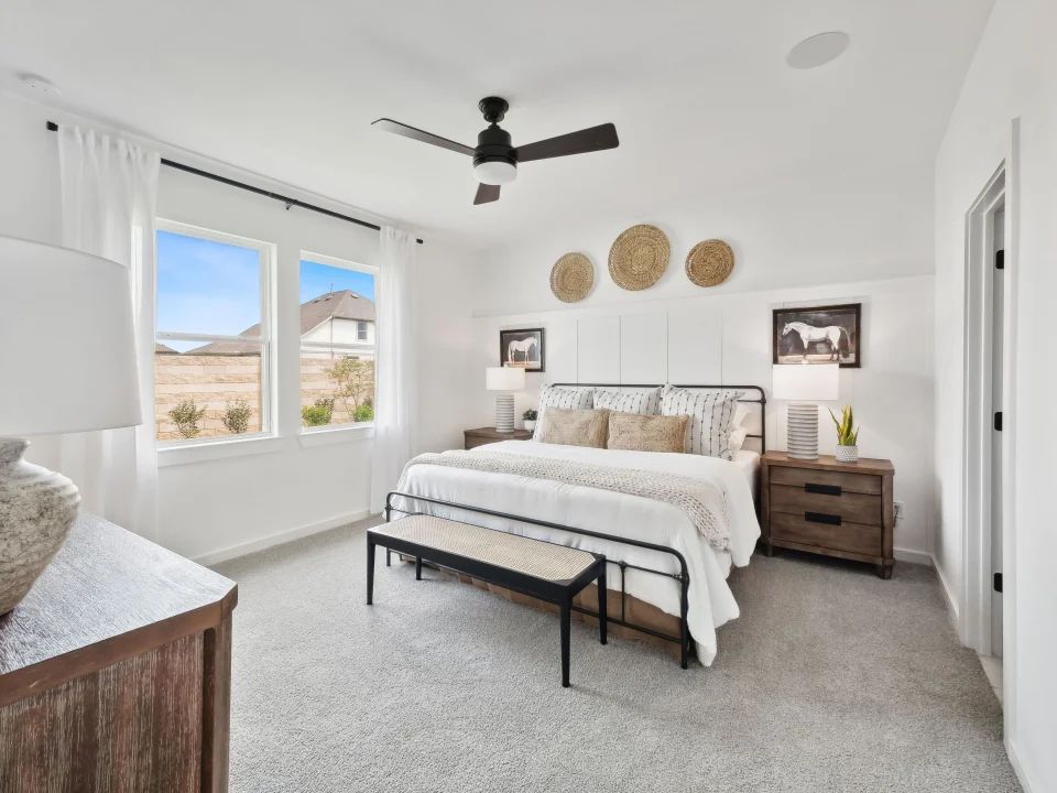 Primary suite with decorative feature wall