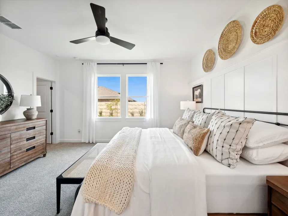 Primary suite with decorative feature wall