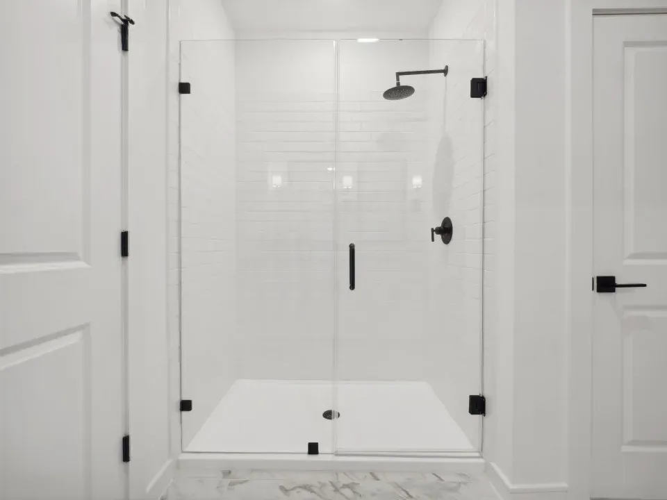 Primary bath with glass shower enclosure