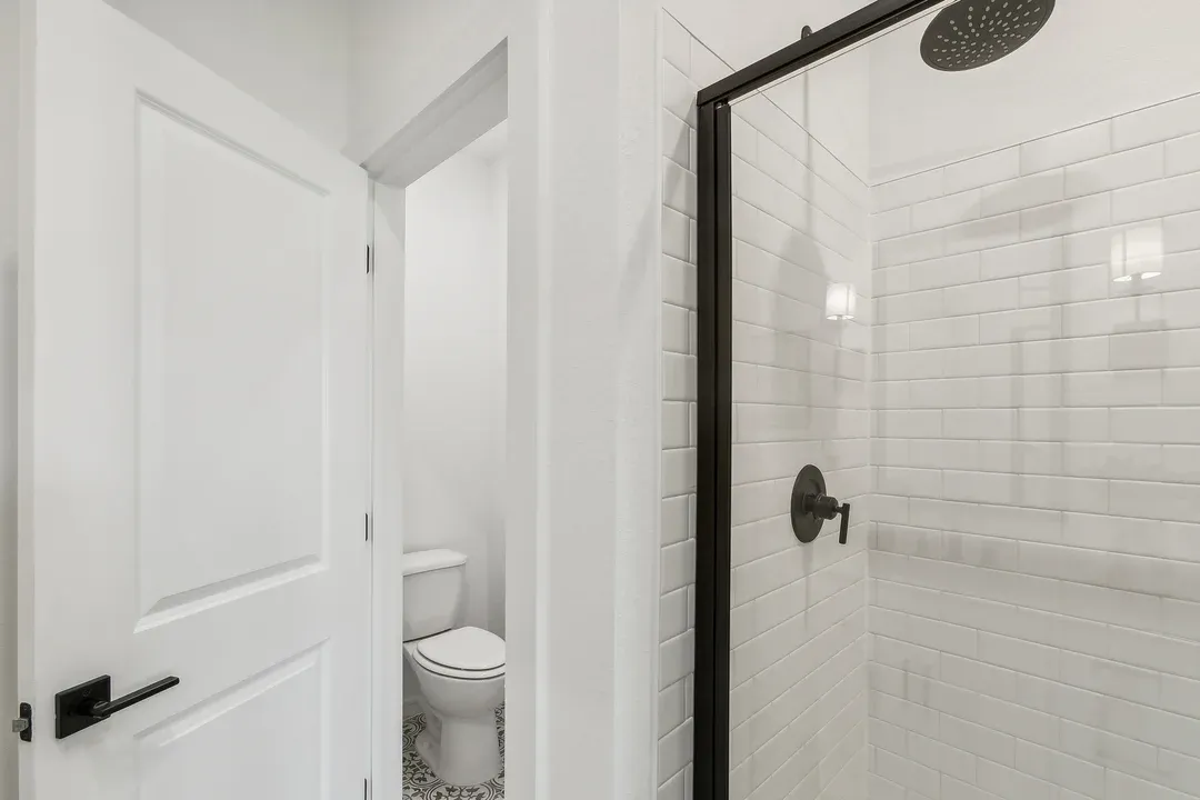 Primary bath with glass shower enclosure