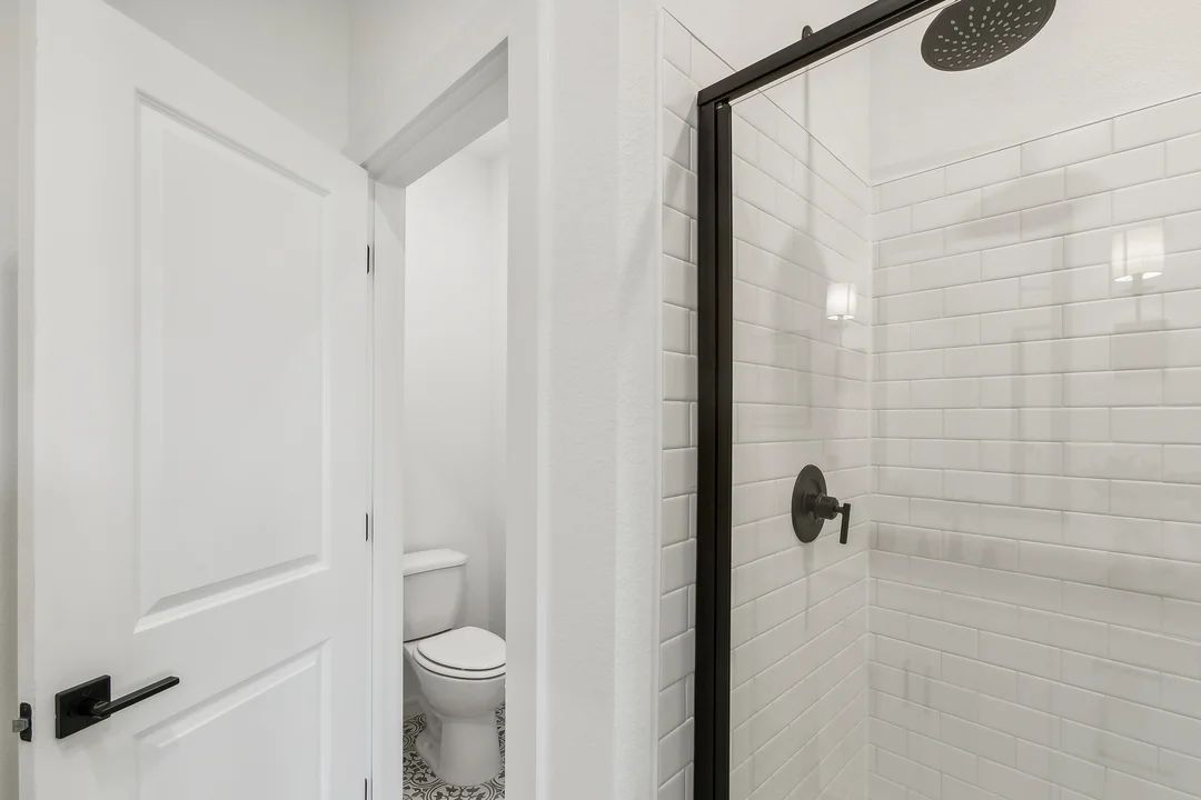 Primary bath with glass shower enclosure