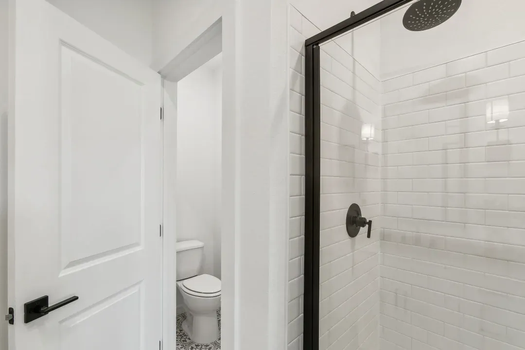 Primary bath with glass shower enclosure