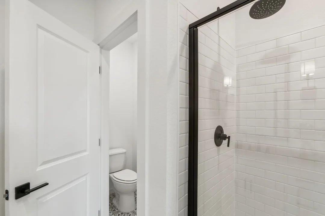 Primary bath with glass shower enclosure