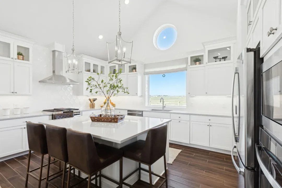 Kitchen with glass upper cabinets