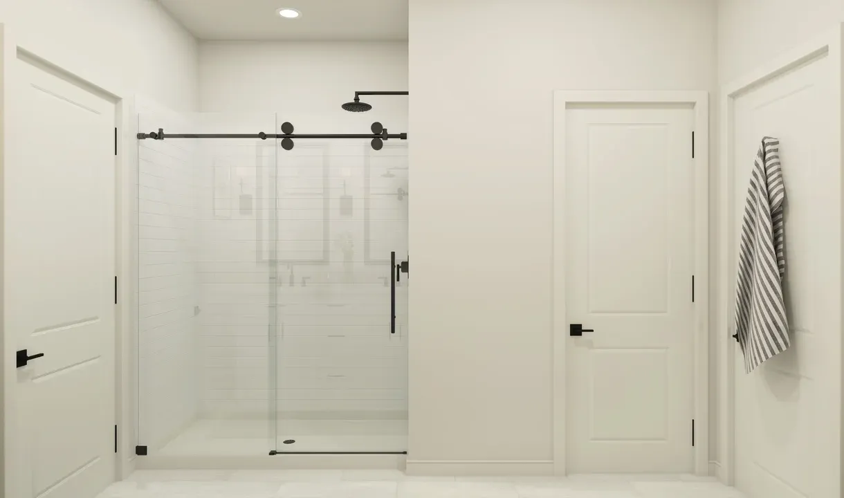 Primary bath with glass shower enclosure