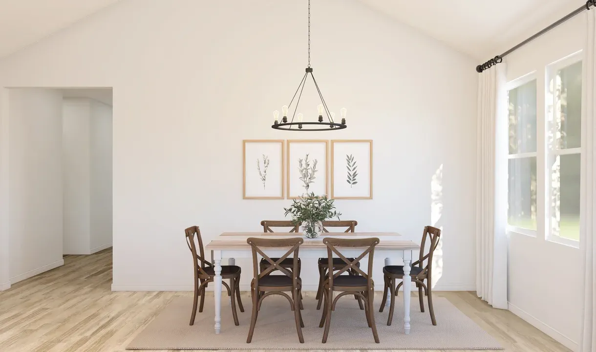 Dining area with chandelier and vaulted ceiling