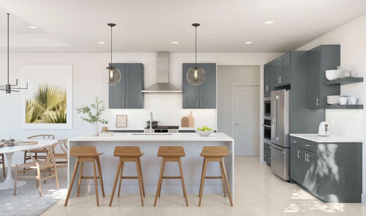 Kitchen with waterfall island and pendant lighting