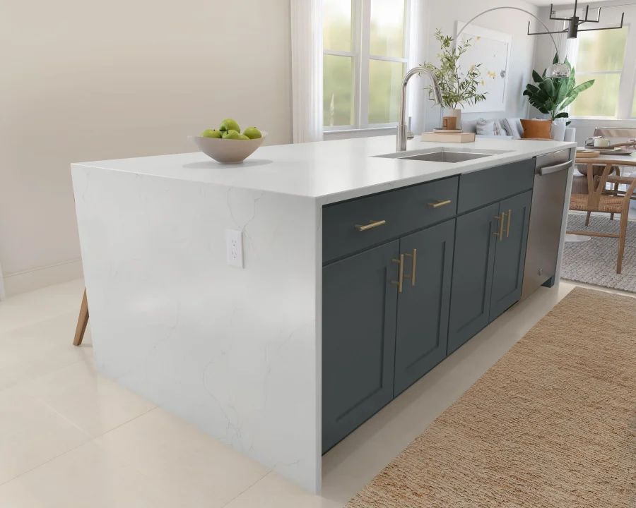Kitchen with waterfall island and stainless steel undermount sink