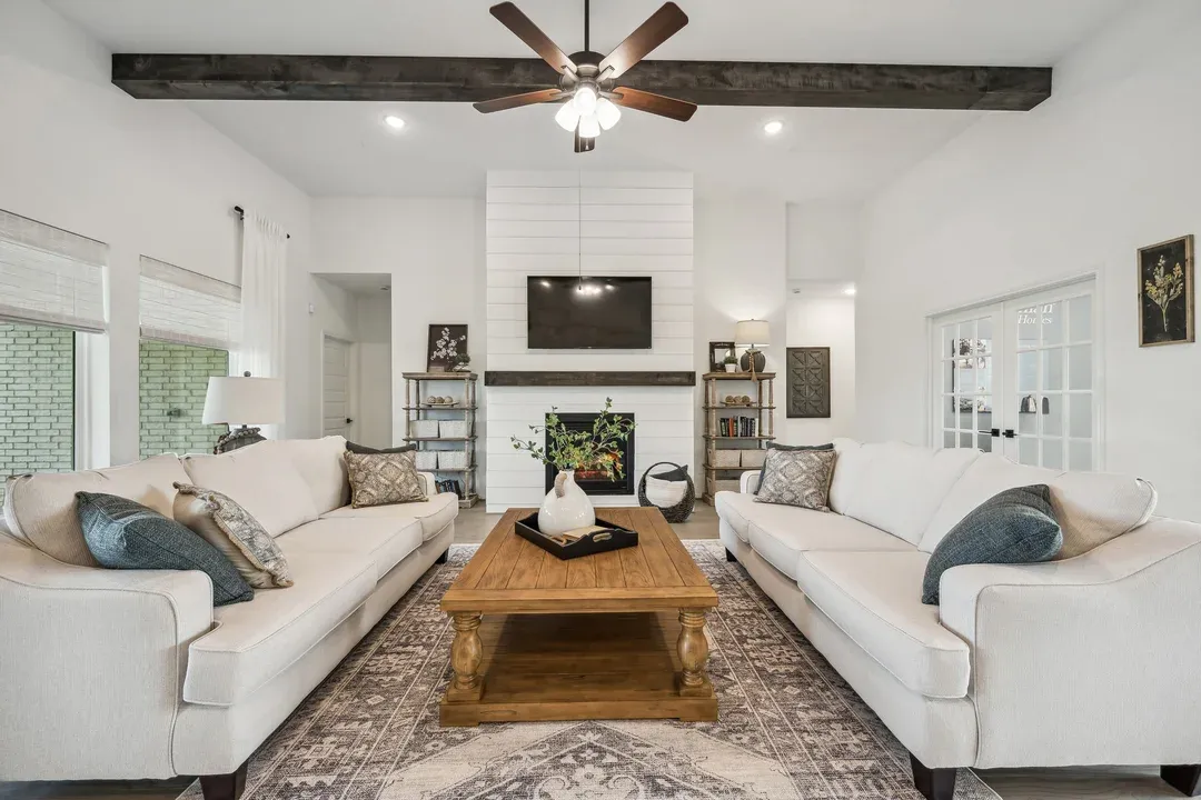 Great room with stained ceiling beams