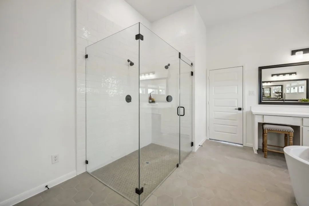 Sleek and frameless glass shower enclosure