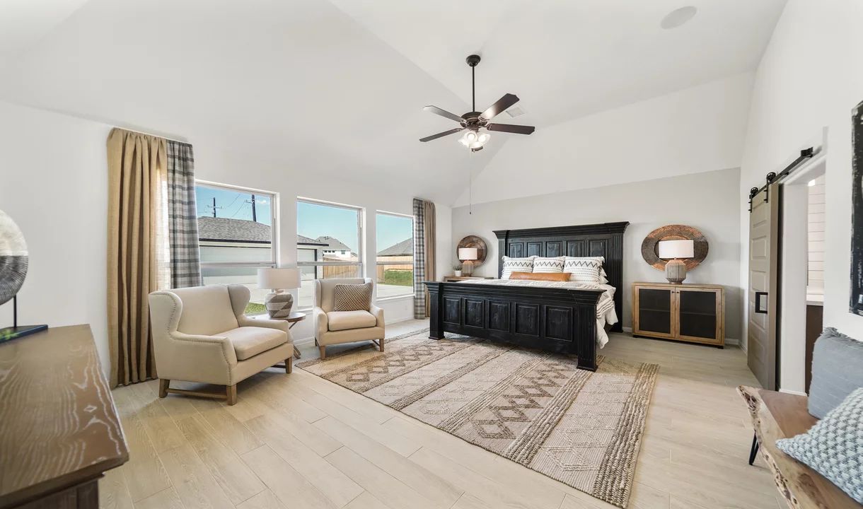 Owner's suite with sloped ceiling