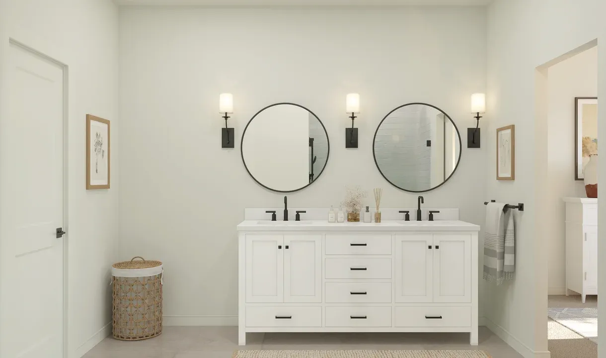 Primary bath features freestanding vanity with dual sinks