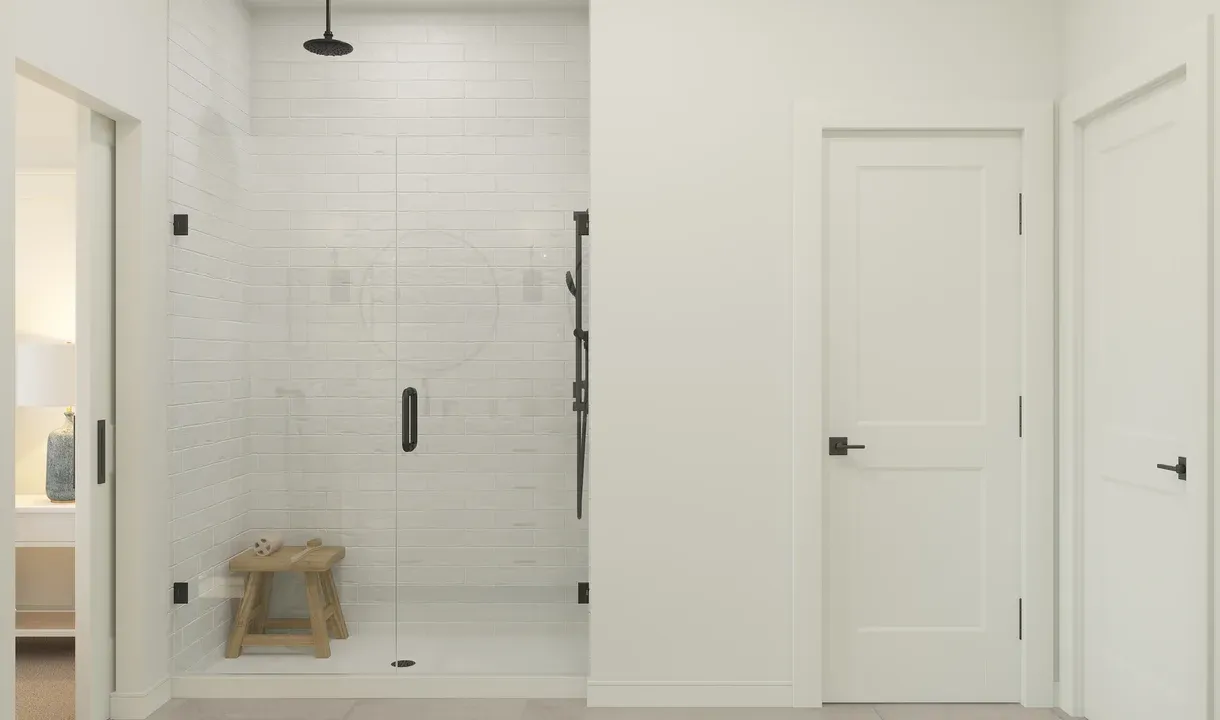 Primary bath with glass shower enclosure