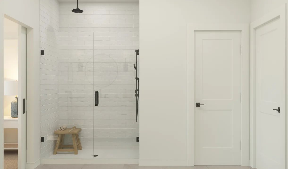 Primary bath with glass shower enclosure