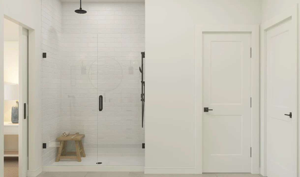 Primary bath with glass shower enclosure
