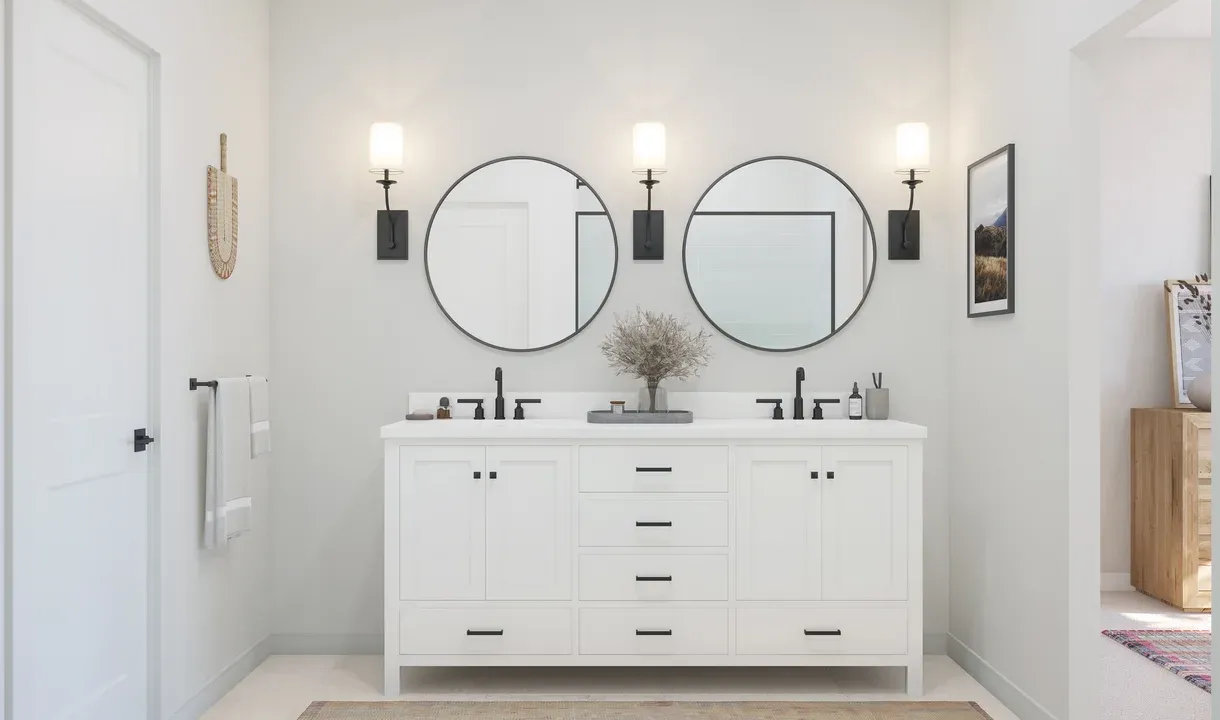 Primary freestanding vanity and black-circular mirrors