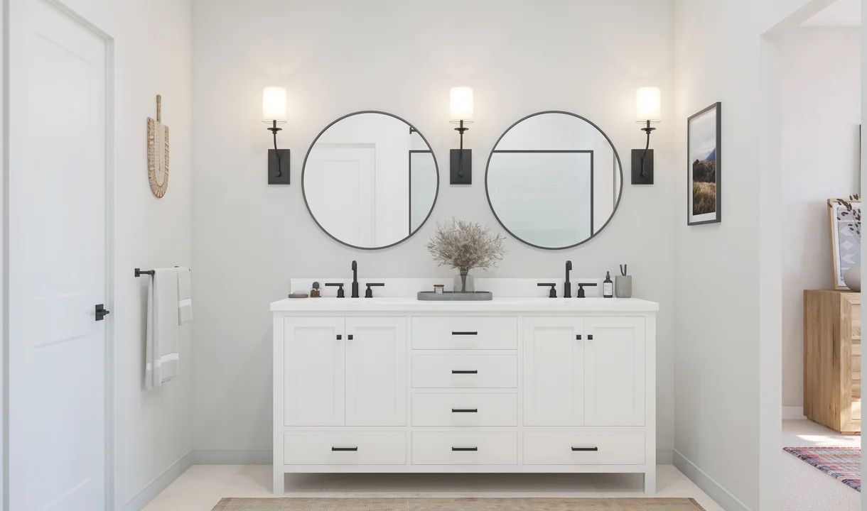 Primary freestanding vanity and black-circular mirrors