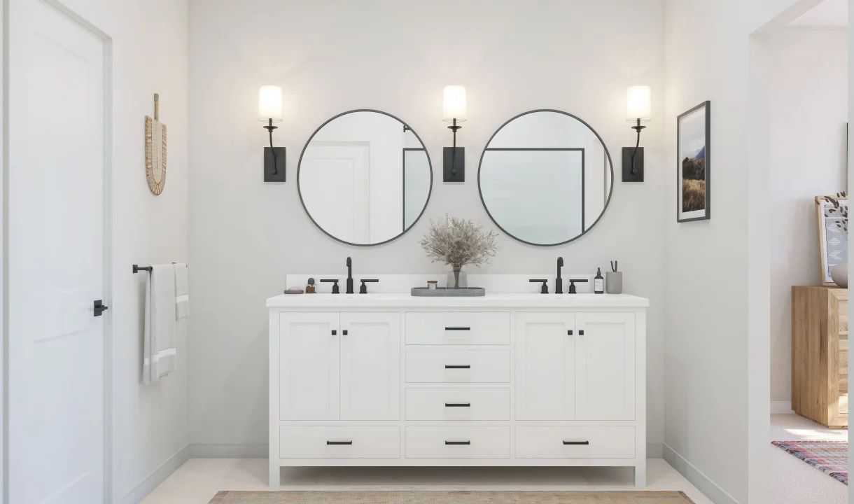 Primary freestanding vanity and black-circular mirrors
