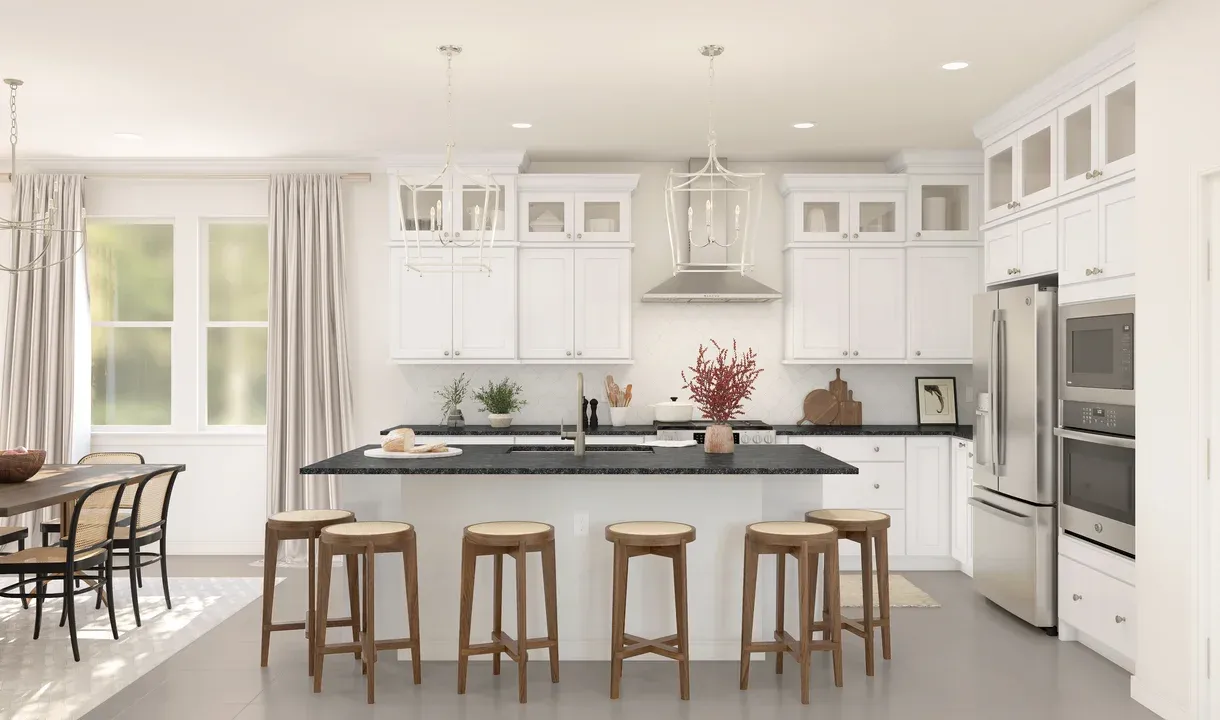 Kitchen with pendant lighting and glass upper cabinets