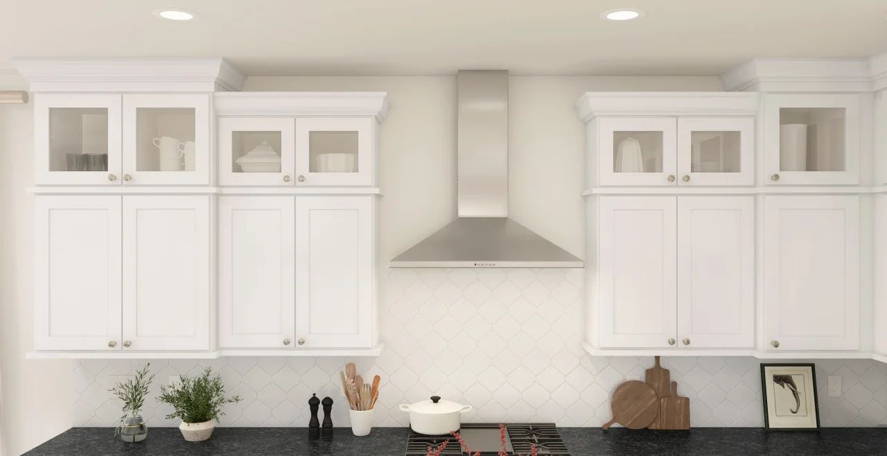 Kitchen with glass upper cabinets and vent hood