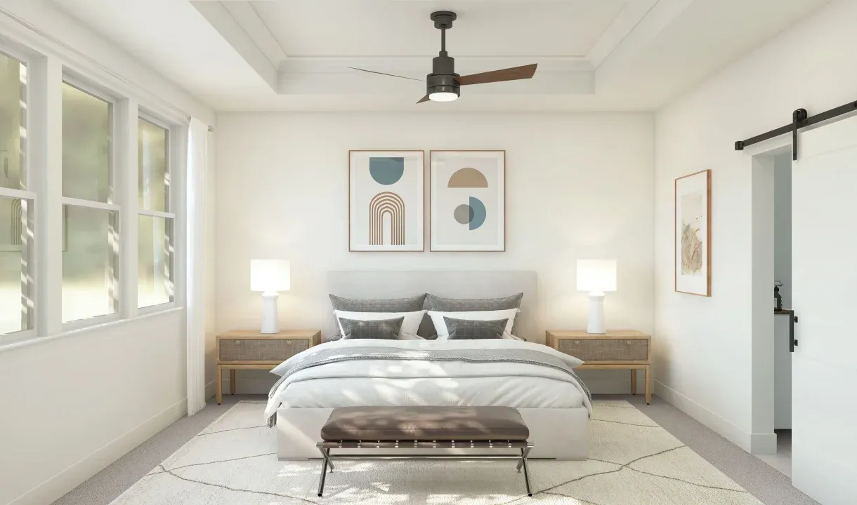 Primary suite with crown moulding and sliding barn door