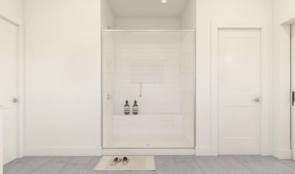 Primary bath with glass shower enclosure
