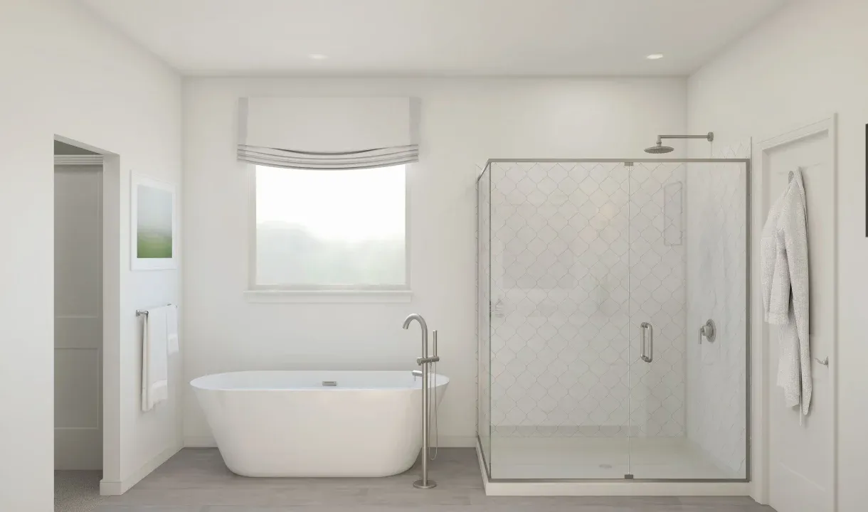 Primary bath with freestanding tub and glass shower enclosure
