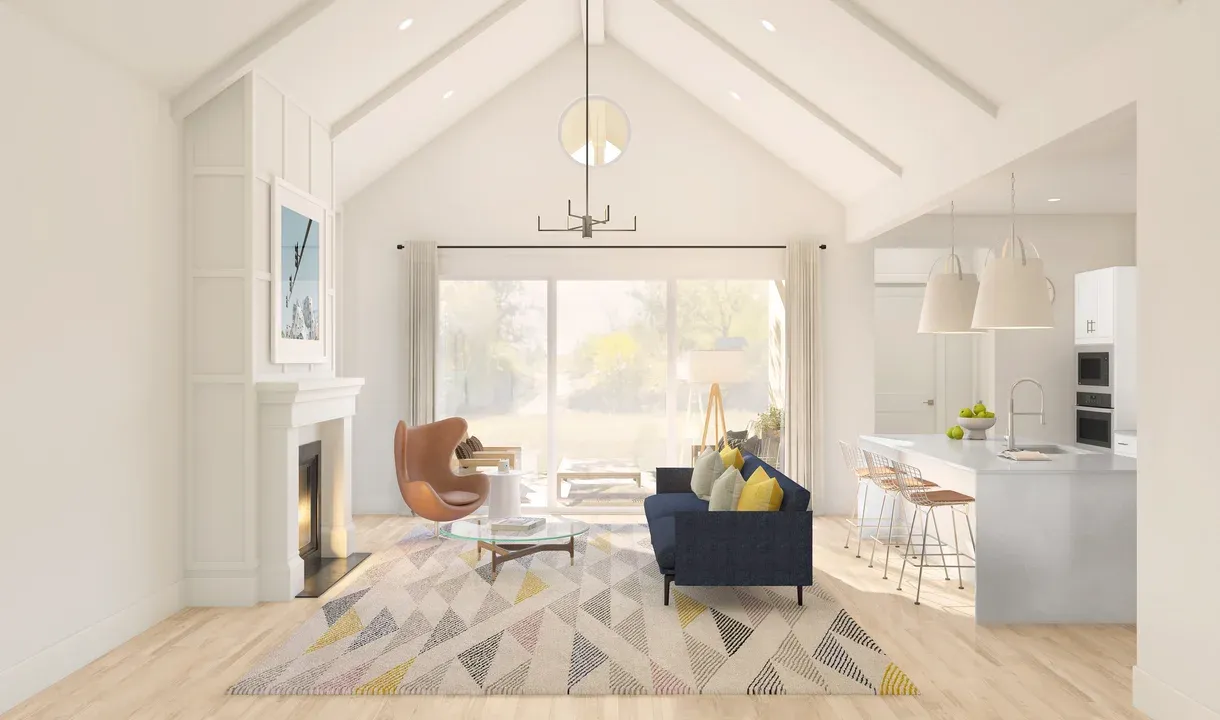 Great room with vaulted ceiling and white painted beams