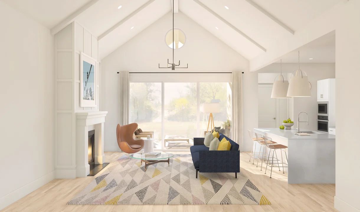 Great room with vaulted ceiling and white painted beams