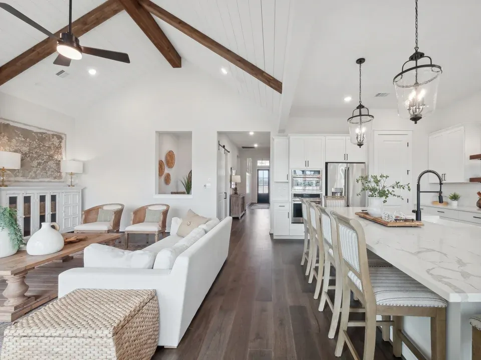 Kitchen with vaulted ceiling and pendant lighting