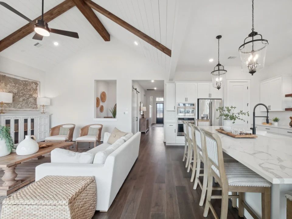 Kitchen with vaulted ceiling and pendant lighting