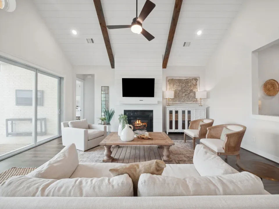 Great room with fireplace and stained ceiling beams
