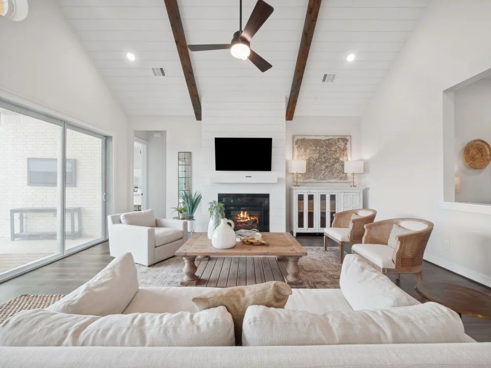 Great room with fireplace and stained ceiling beams