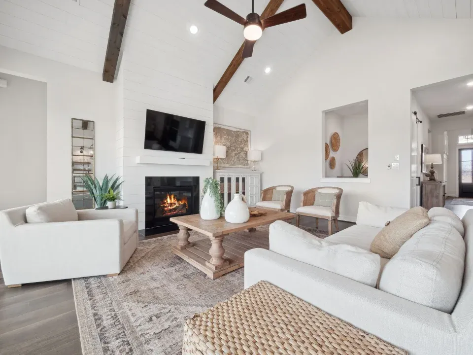 Great room with vaulted ceiling and fireplace